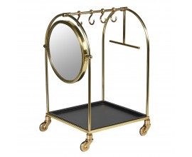 Glamour zaoblený věšák na kolečkách Arcondo z kovu ve zlaté barvě s kulatým zrcadlem se čtyřmi háčky se čtvercovou spodní policí se čtyřmi kolečky