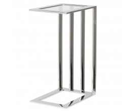 Moderní designový příruční stolek Slater s průhlednou obdélníkovou skleněnou deskou v kovovém rámu s obdélníkovou podstavou a čtyřmi nohama na jedné straně v lesklém chromovém provedení