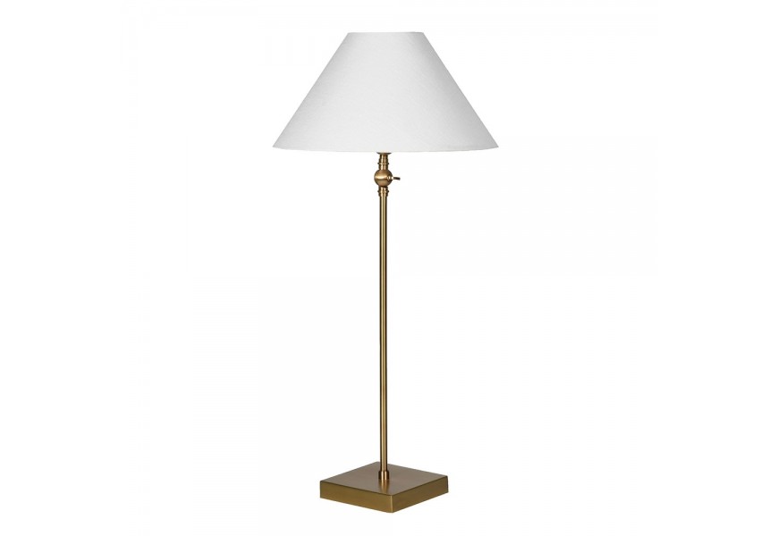 Luxusní glamour stolní lampa Tarkten se štíhlou zlatou kovovou nohou se čtvercovou podstavou a kulatým dole rozšířeným stínítkem ze lnu v bílé barvě Luxusní glamour stolní lampa Tarkten se štíhlou zlatou kovovou nohou se čtvercovou podstavou a kulatým dole rozšířeným stínítkem ze lnu v bílé barvě