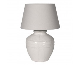 Provensálská keramická bílá stolní lampa Corynth s mohutnou kulatou podstavou s minimalistickým plastickým zdobením a glazurou s vysokým leskem s kónickým stínítkem ze lnu