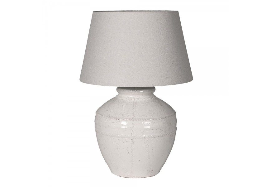 Provensálská keramická bílá stolní lampa Corynth s mohutnou kulatou podstavou s minimalistickým plastickým zdobením a glazurou s vysokým leskem s kónickým stínítkem ze lnu Provensálská keramická bílá stolní lampa Corynth s mohutnou kulatou podstavou s minimalistickým plastickým zdobením a glazurou s vysokým leskem s kónickým stínítkem ze lnu