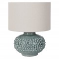 Designová keramická stolní lampa Gladis s kulatou keramickou podstavou s reliéfními kulatými výběžky v pastelové tyrkysově modré barvě s lesklou glazurou s kulatým stínítkem s lněné textilie v bílé barvě Designová keramická stolní lampa Gladis s kulatou keramickou podstavou s reliéfními kulatými výběžky v pastelové tyrkysově modré barvě s lesklou glazurou s kulatým stínítkem s lněné textilie v bílé barvě