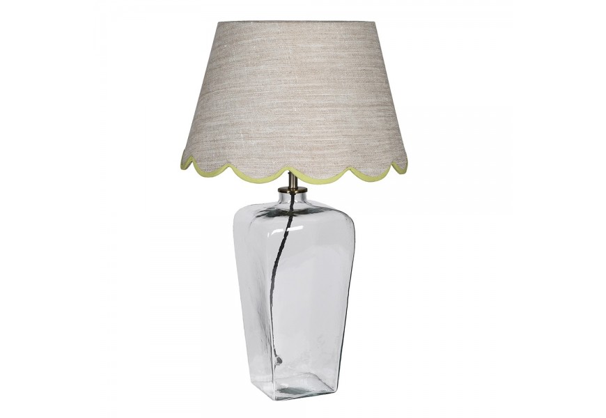 Venkovská skleněná noční lampa Bella Verde s průhlednou nohou se lněným stínítkem v béžové barvě a zeleným lemem