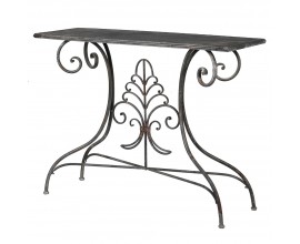 Klasick&yacute; konzolov&yacute; stolek Turia v obd&eacute;ln&iacute;kov&eacute;m tvaru v čern&eacute; barvě z kovu se zdoben&iacute;m s flor&aacute;ln&iacute;m motivem