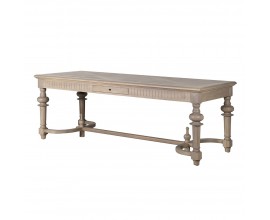 Luxusní venkovský vintage jídelní stůl Lilibet s obdélníkovou vrchní deskou se zásuvkou s bohatě vyřezávanými nožičkami s designem soustruženého dřeva s půlkruhovými spojnicemi z masivního jilmového dřeva ve světle hnědé krémové barvě