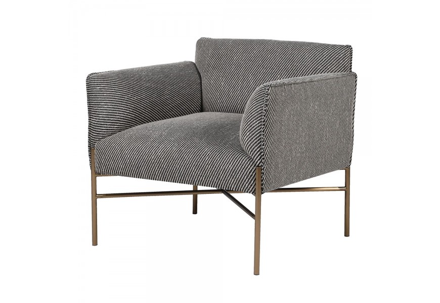 Luxusní moderní šedé čalouněné hranaté křeslo Alana s textilním potahem s diagonálním tkaním v bílé a černé barvě se štíhlými nožičkami z kovu ve zlaté barvě