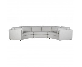 Luxusn&iacute; modern&iacute; sedka Jules pro &scaron;est osob ve tvaru půlkruhu rozdělen&aacute; na tři segmenty se &scaron;esti opěrkov&yacute;mi pol&scaron;t&aacute;ři na mal&yacute;ch čern&yacute;ch nožičk&aacute;ch s textiln&iacute;m potahem v b&iacute;l&eacute; barvě s v&yacute;raznou strukturou s jemn&yacute;m &scaron;ed&yacute;m mel&iacute;rov&aacute;n&iacute;m