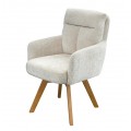 Moderní skandinávské jídelní křeslo Dover s čalouněním a potahem z žinylkové textilie v krémové béžové barvě s otočným sedákem a opěrkami na ruce s prošívaným opěrkovým polštářem a masivními nohama z bukového dřeva v naturální světle hnědé barvě